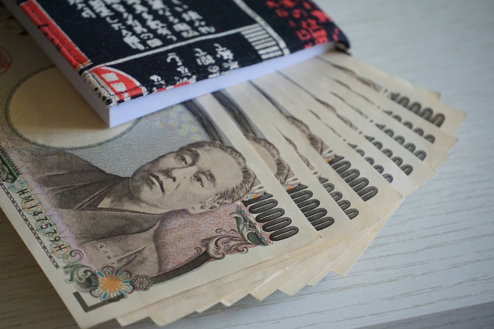 Japanese ten-thousand-yen banknotes laid on a table
